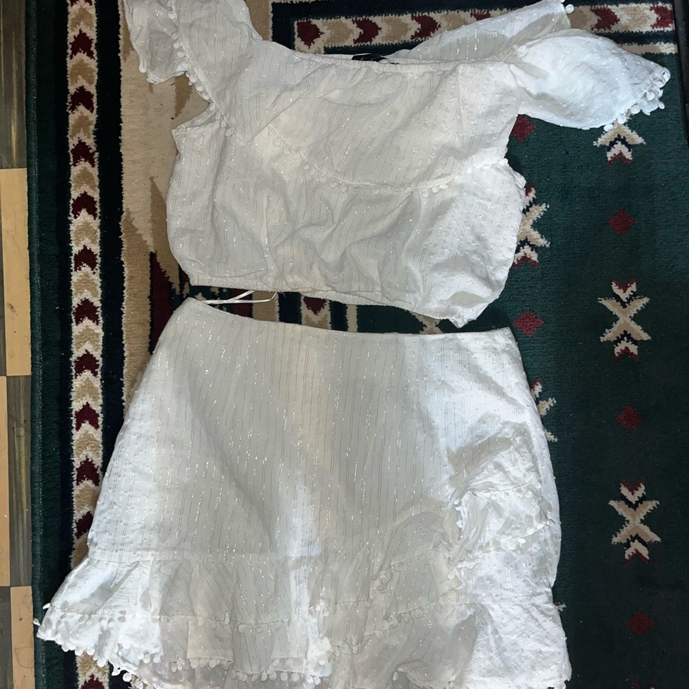 Blue blush white sparkly off the shoulder top and ruffle skirt